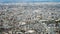 Aerial top down view over Osaka city Japan with highway cross roads and high building