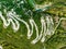 Aerial top down view of serpentine narrow road leading to Vikos Gorge in Northern Greece. A road full of twists and turns winding