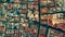 Aerial top down view to mosaic pattern of residential area roofs. Almeria, Spain