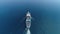 Aerial top drone view of luxury large cruise ship with pool sailing full speed on open blue water,