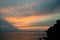 Aerial top panoramic view of horizon with dramatic sky at sunset dusk, Gulf of Genoa, Ligurian Sea, coastline of Riviera di Levant