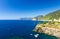 Aerial top panoramic view of yachts boats sail on water of Ligurian Sea near coastline of Riviera di Levante, National park Cinque