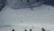 Aerial top view of alpine skiing downhil piste