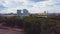 Aerial top view of amusement park for children on a summer day. Ferris wheel in the central park of the city. Aerial