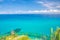 Aerial top view of beautiful amazing Tyrrhenian sea with turquoise water, tropical seascape, endless horizon with bright blue sky