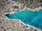 Aerial top view of the beautiful bay at the Limanakia area, Vouliagmeni, Athens