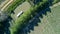 Aerial top view of boat in Canal du Midi from above, family travel by barge and vacation in France