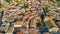 Aerial top view of Bram medieval village architecture and roofs from above, France