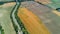 Aerial top view of Canal du Midi and vineyards from above, beautiful rural countryside landscape of France