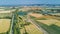 Aerial top view of Canal du Midi and vineyards from above, beautiful rural countryside landscape of France