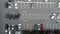 Aerial top view of car parking near business center with parked automobiles business class. Drone flying above cars parking