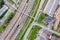 Aerial top view on city industrial area with railroad cargo tracks