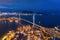 Aerial top view of container cargo ship in the export and import business and logistics international goods in urban city.