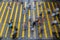 Aerial top view of crowd of people walking on street over zebra crossing or pedestrian crossing. Business traffic road in busy