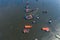 Aerial top view of group of container cargo ships in the export, import business, logistics and transportation concept with