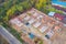 Aerial top view of homes or houses in village under construction site with structure. Top view of precast concrete slap floor.