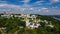 Aerial top view of Kiev Pechersk Lavra churches on hills from above, cityscape of Kyiv, Ukraine