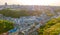 Aerial top view of Kyiv cityscape of Vozdvizhenka and Podol historical districts on sunset from above, city of Kiev