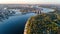 Aerial top view of Kyiv skyline, Dnieper river and Truchaniv island from above, sunset in Kiev city