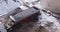 Aerial top view of a large truck unloading rubble on a construction site. Preparation for construction.