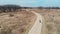 Aerial top view man who rides a Bicycle in an Illinois state Park. Bike ride in the Park. The drone follows a cyclist