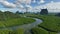 Aerial top view of mangrove forest, drone flying over the river