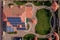 Aerial top view of new modern residential house cottage with blue panels. Renewable ecological green energy production concept