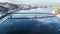 Aerial top view of pedestrian and cycling path lane on Park bridge in winter and Dnieper river from above, city of Kyiv Kiev