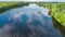 Aerial top view of people kayaking, man paddling in kayak on river canoe tour having fun, active weekend and vacation