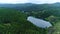 Aerial top view perspective of Trou Aux Cerf Volcano Curipipe in the tropical island jungle of Mauritius aerial slow