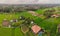 Aerial top view photo from flying drone of green rice fields in countryside Land with grown plants of paddy. Bali