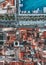 Aerial top view of the red-roofed buildings and ships