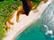 Aerial top view of river merging to tropical white sand beach and turquoise clear sea water