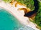 Aerial top view of river merging to tropical white sand beach and turquoise clear sea water