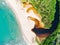 Aerial top view of river merging to tropical white sand beach and turquoise clear sea water