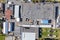 Aerial top view of roofs of buildings and warehouses at industrial district