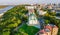 Aerial top view of Saint Andrew`s church and Andreevska street from above, cityscape of Podol district, city of Kiev