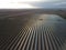 Aerial top view of a solar panels power plant. Photovoltaic solar panels at sunrise and sunset in countryside from above