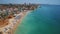 Aerial top view of tourists resting on the beach Alemao Vau, Boia, tres irmaos, Portimao Algarve coast. Portugal.