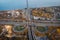 Aerial or top view of transport junction, asphalt roads with crossroad and circle intersections, city traffic cars from above