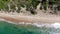 Aerial top view of tropical white sand beach and turquoise clear sea water