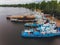Aerial top view Tugboat, Tanker and container ship parking in shipyard for repair. Can use for shipping or