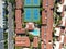 Aerial top view of typical south california community condo with tennis court and pool