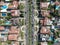 Aerial top view of wealthy area with big houses and small street in Central Los Angeles