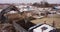 Aerial top view: yellow excavator pouring soil into tipper. Preparing place to construction residential house. top down