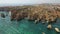 Aerial. Tourist boats in the bay Ponta de Piedade.