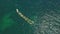 Aerial. Tourists entertained at boating and kayaking in the bay Ponta de Piedade.