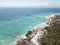 Aerial from Toya Pakeh Harbour Nusa Penida Bali Indonesia. View of turquoise water in bay. In the background, the island