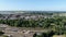 Aerial tracking shot of train leaving the Deventer railway station in the Netherlands