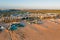 Aerial from traditional fishermen huts on the beach in Armacao de Pera in Portugal